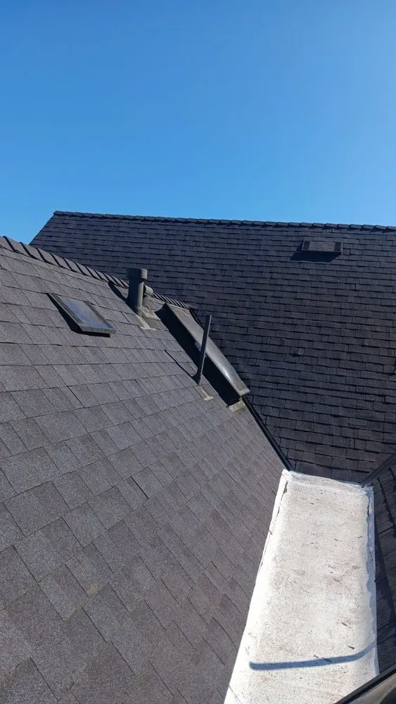 Slide of R Squared Roofing Services