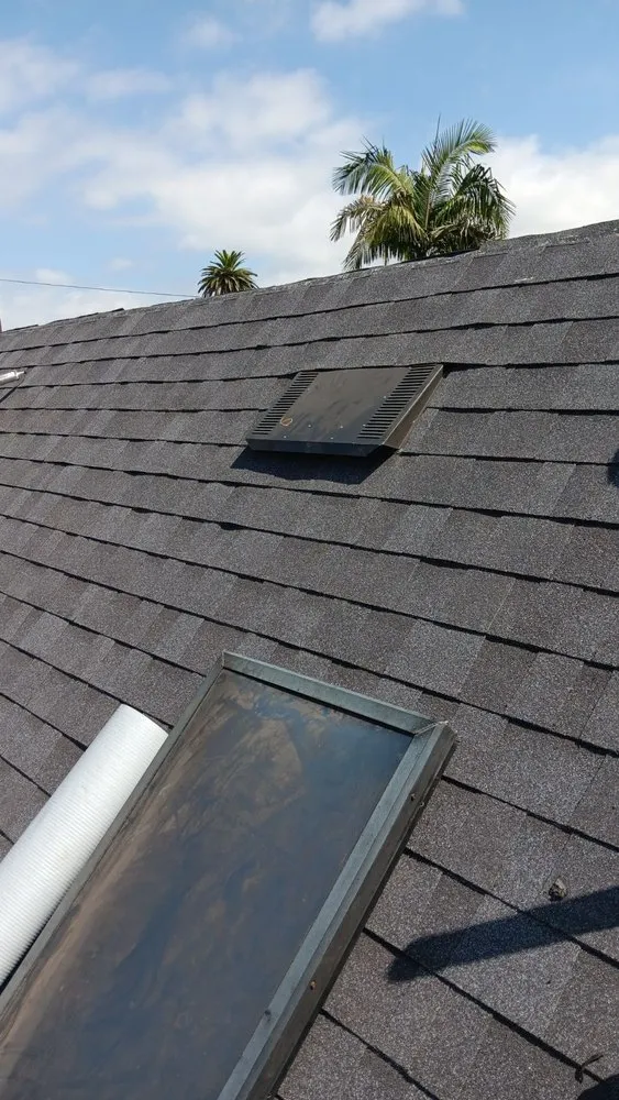 Slide of R Squared Roofing Services