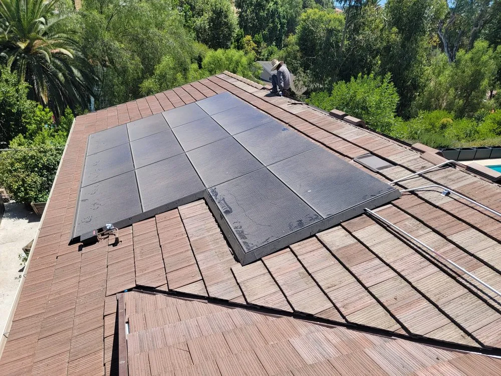 Slide of R Squared Roofing Services