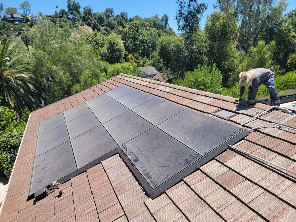 Slide of R Squared Roofing Services