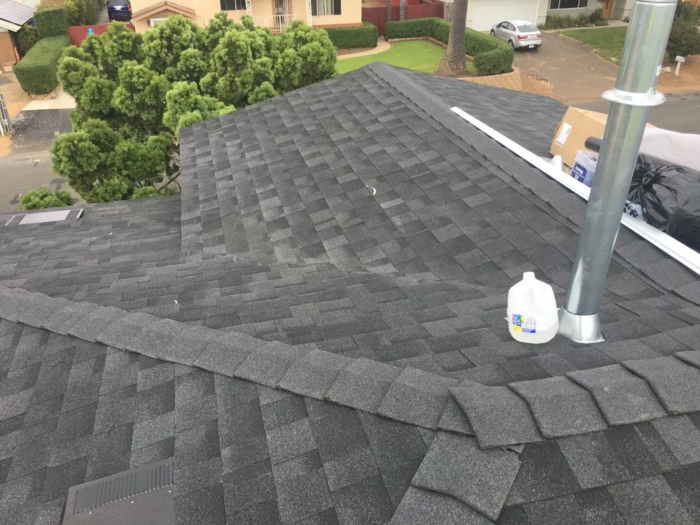 Slide of R Squared Roofing Services