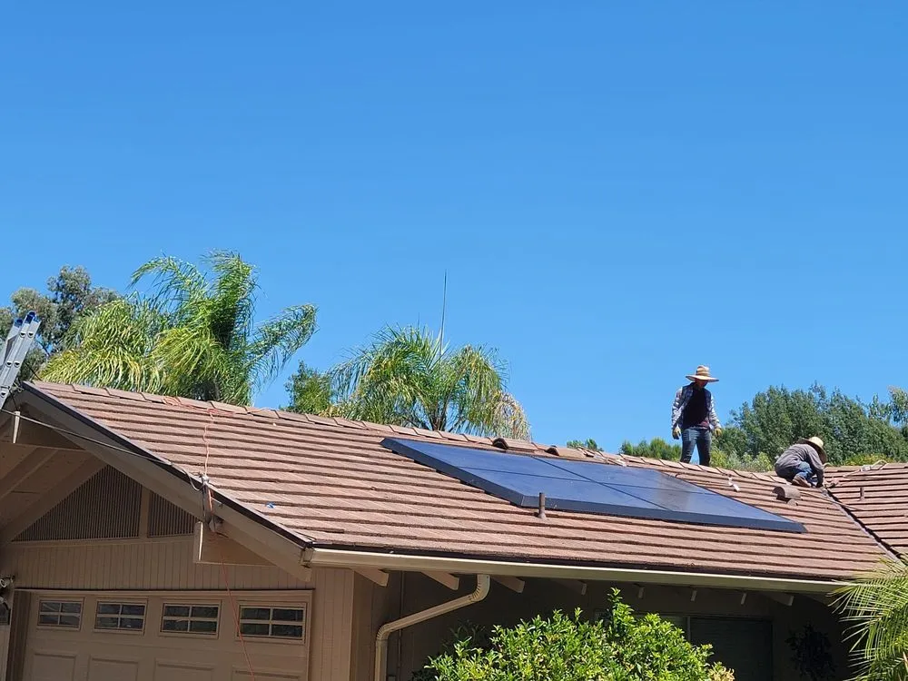 Slide of R Squared Roofing Services