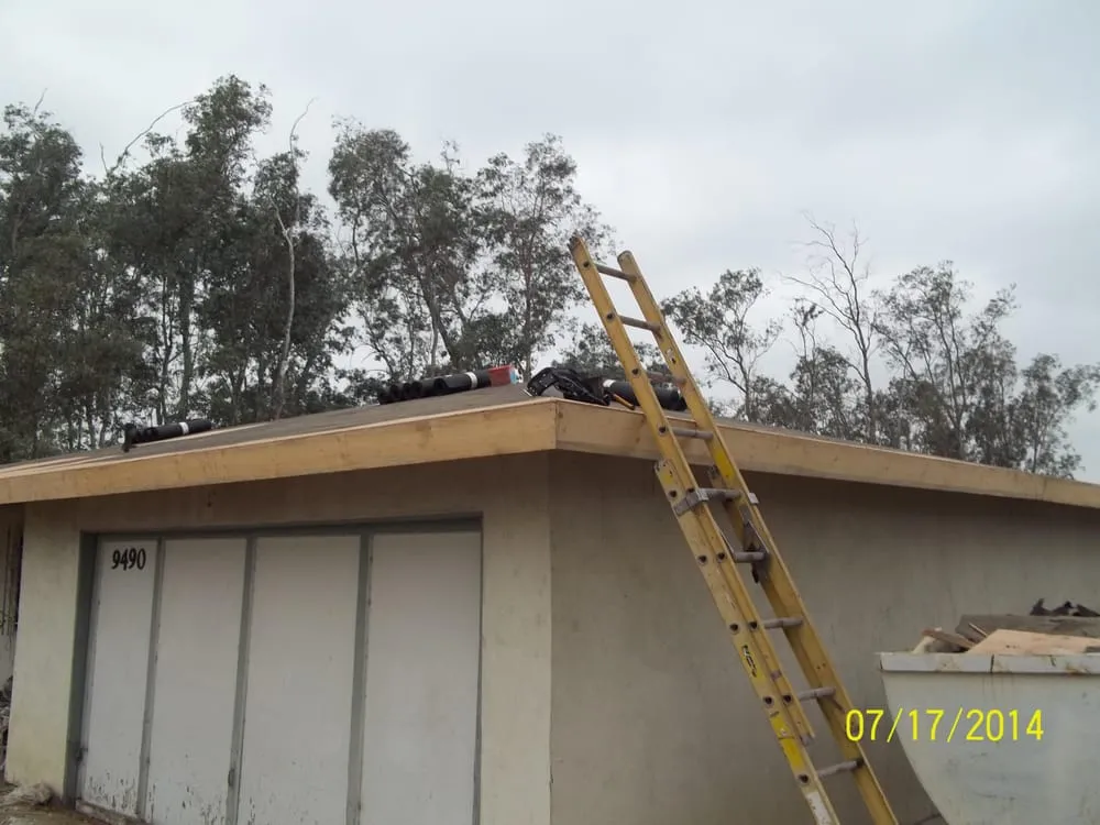 Slide of R Wences Roofing Co