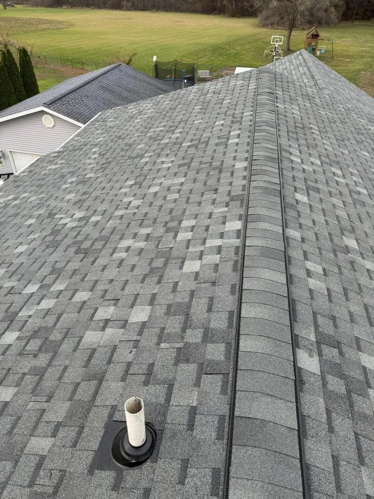 Expert shingle roofing service in Columbiaville, MI by RA roofing & construction