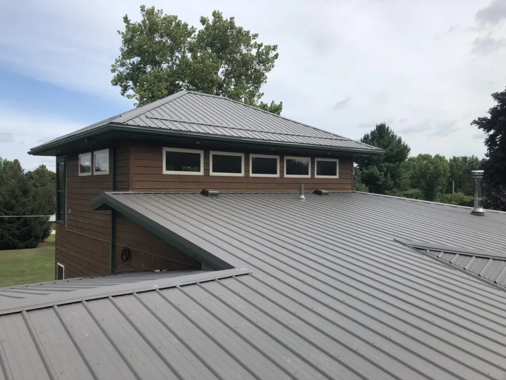 Slide of Raber Roofing Systems