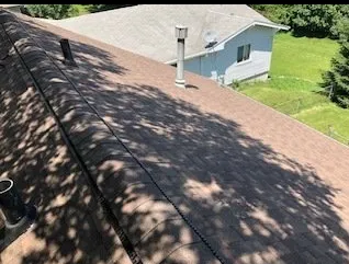 Slide of Raber Roofing Systems