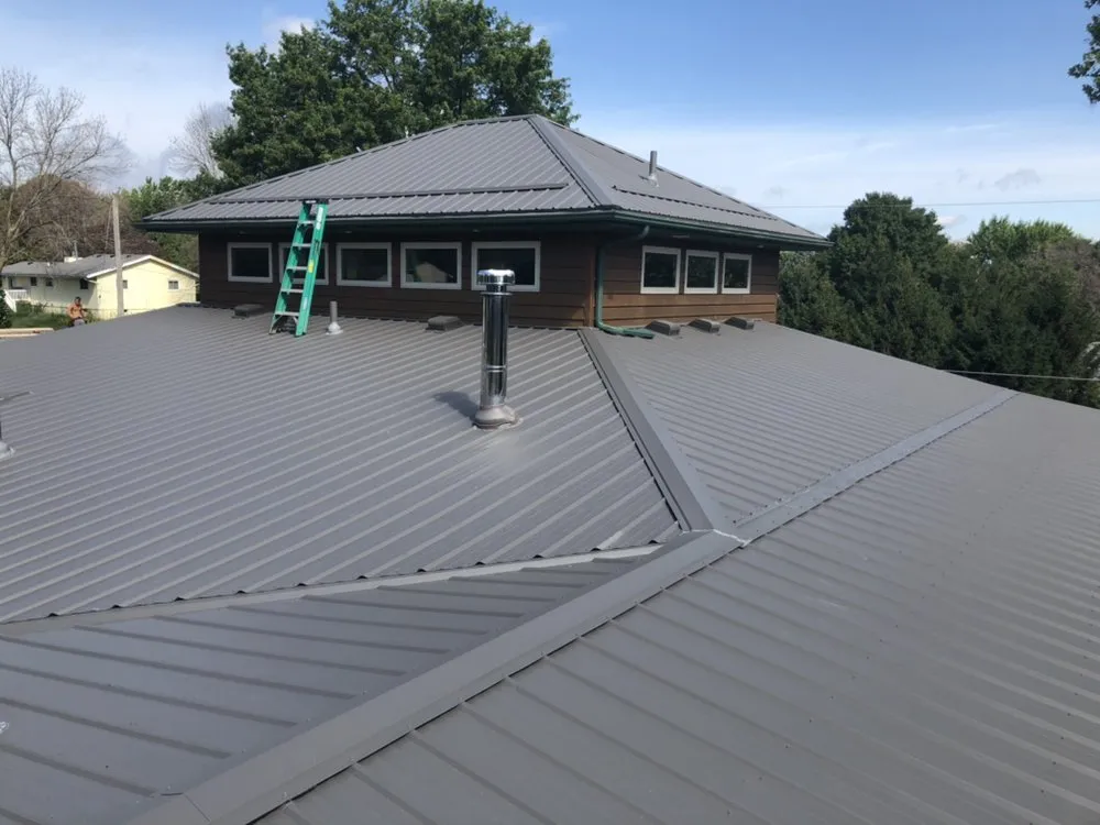 Slide of Raber Roofing Systems