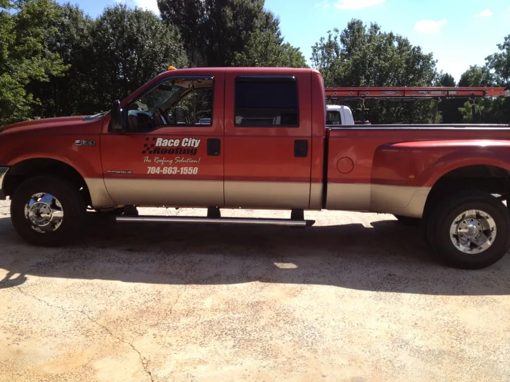 Slide of Race City Roofing