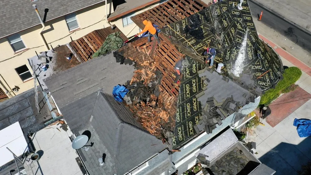 Slide of Rafael’s Tear-off & Hauling