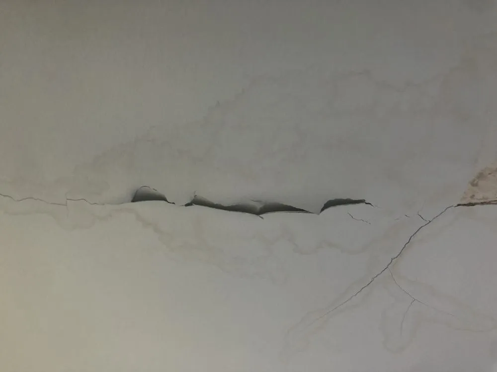 Slide of Rain -A-Way Gutter