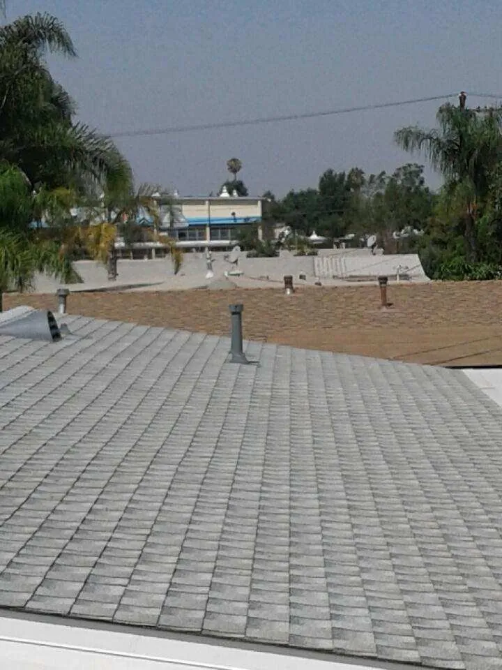 Slide of Rain Dance Roofing