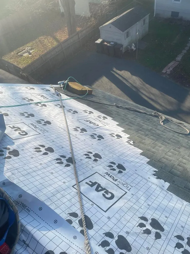 Slide of Rain Day Roofing