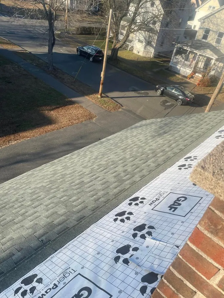 Slide of Rain Day Roofing