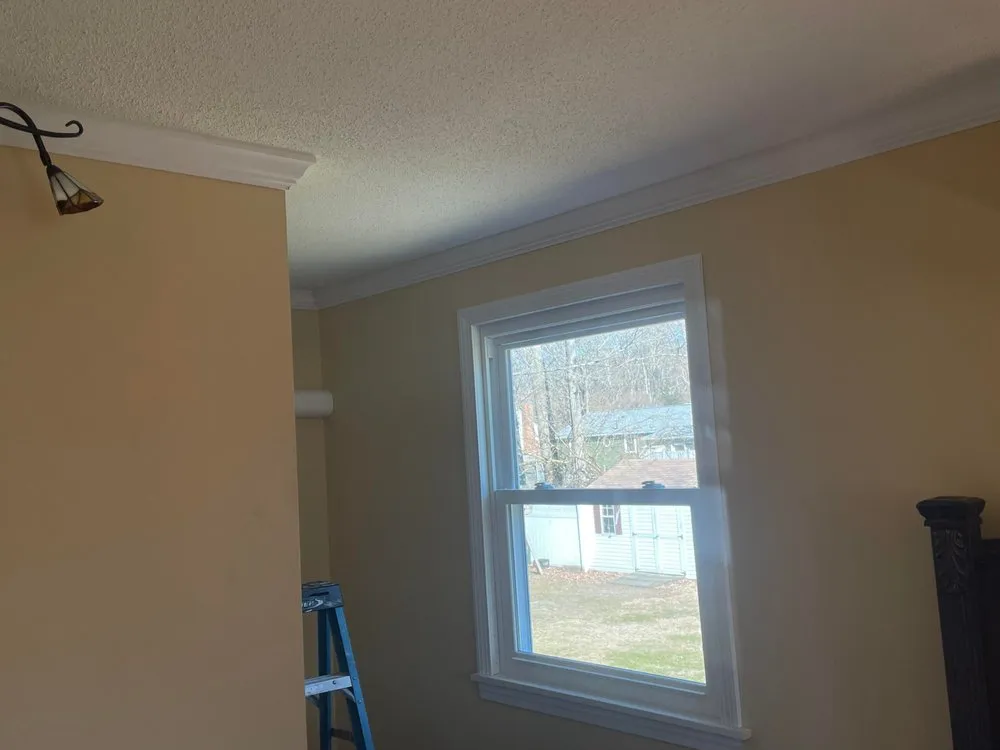 Slide of Rain Day Roofing