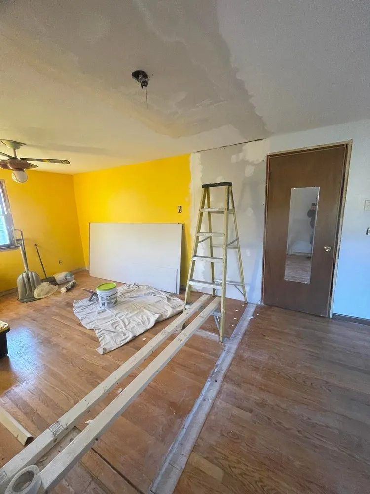 Slide of Rain Day Roofing