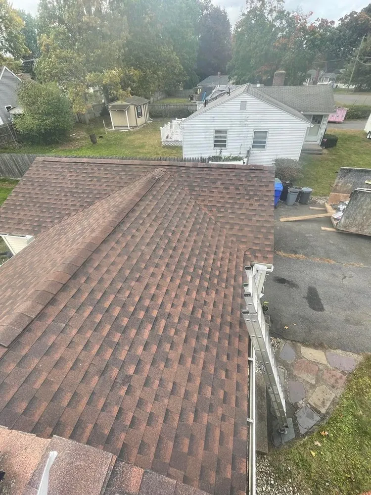 Slide of Rain Day Roofing