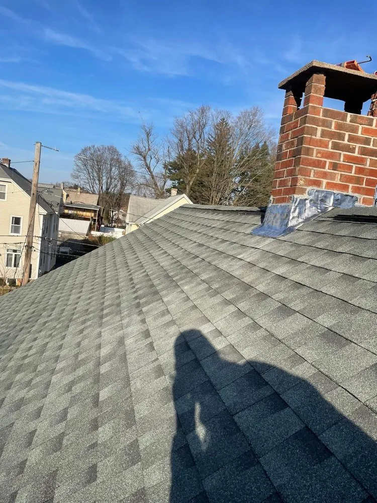 Slide of Rain Day Roofing