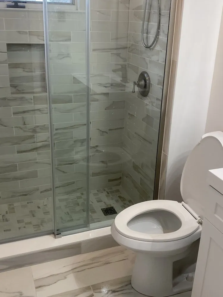 Slide of Rain King Building & Renovations