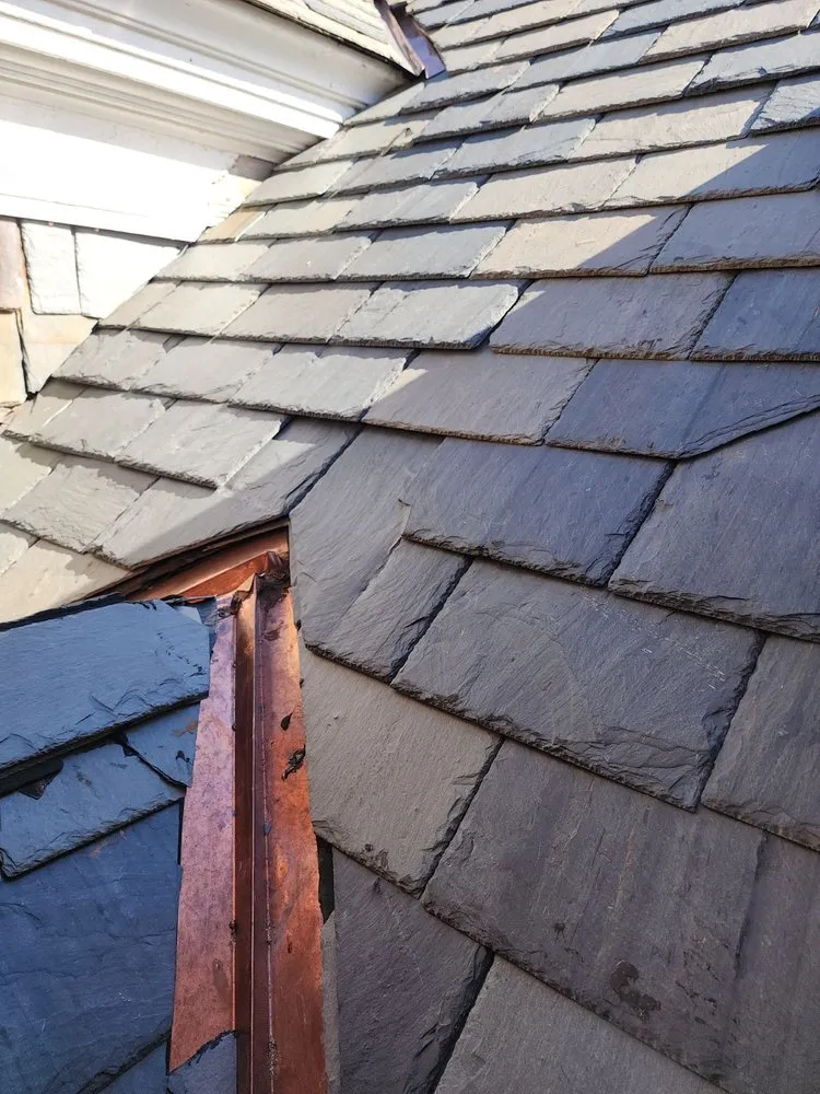 Slide of Rain or Shine Roofing & Solar