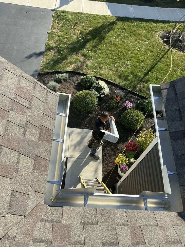 Slide of Rain Solutions Gutters & Roofing