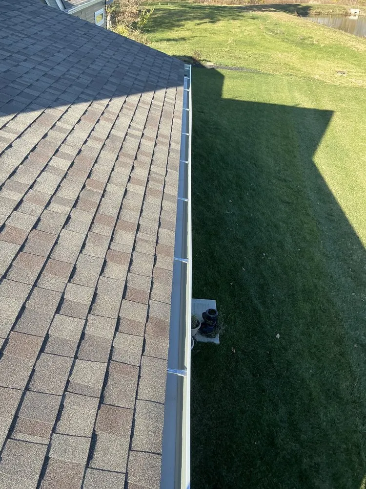 Slide of Rain Solutions Gutters & Roofing