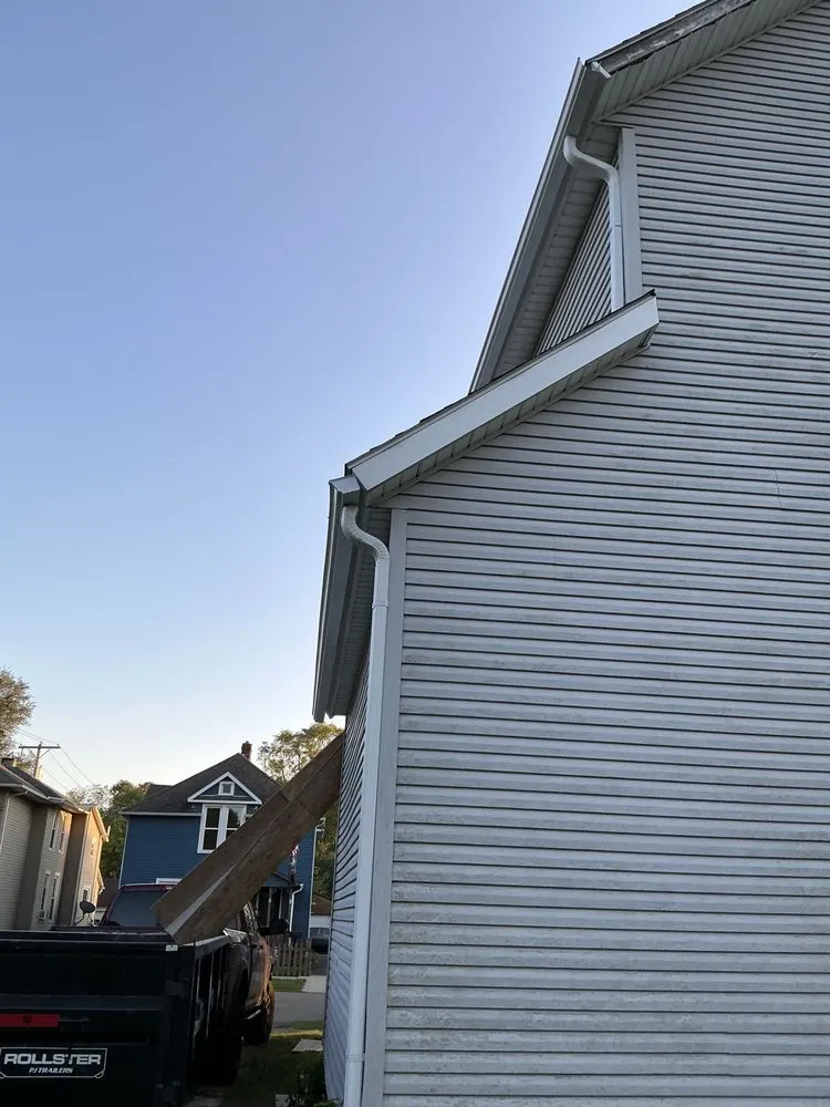 Slide of Rain Solutions Gutters & Roofing