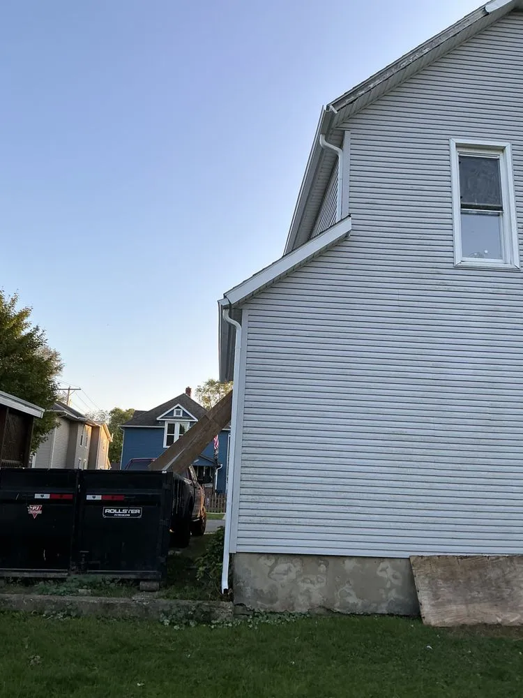 Slide of Rain Solutions Gutters & Roofing