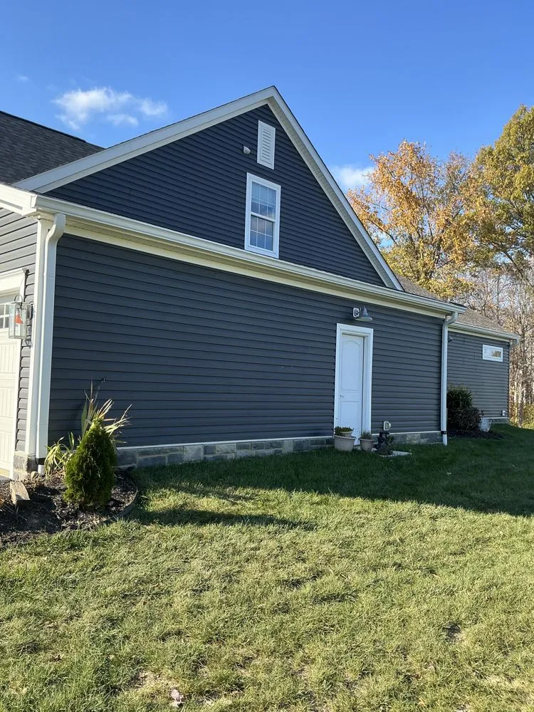 Slide of Rain Solutions Gutters & Roofing