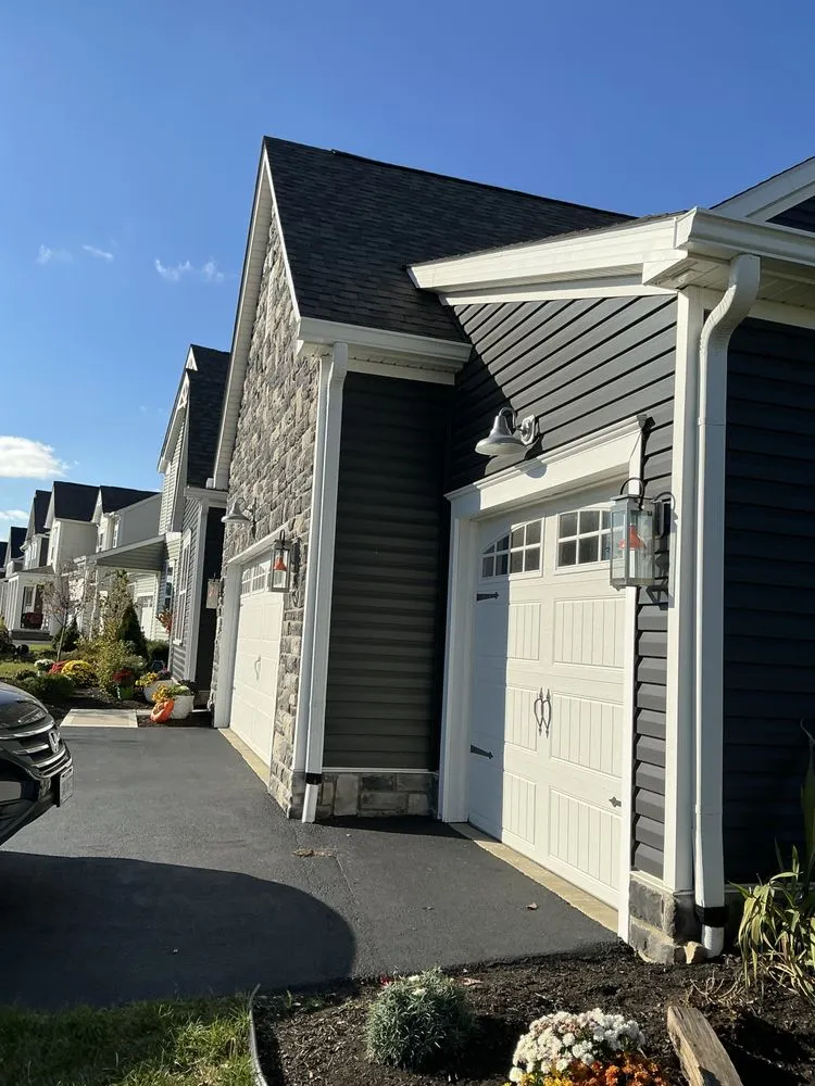 Slide of Rain Solutions Gutters & Roofing