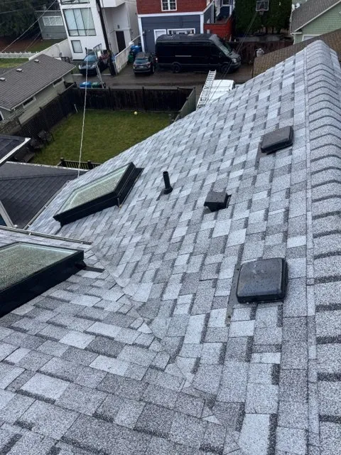 Slide of Rain Stop Roofing