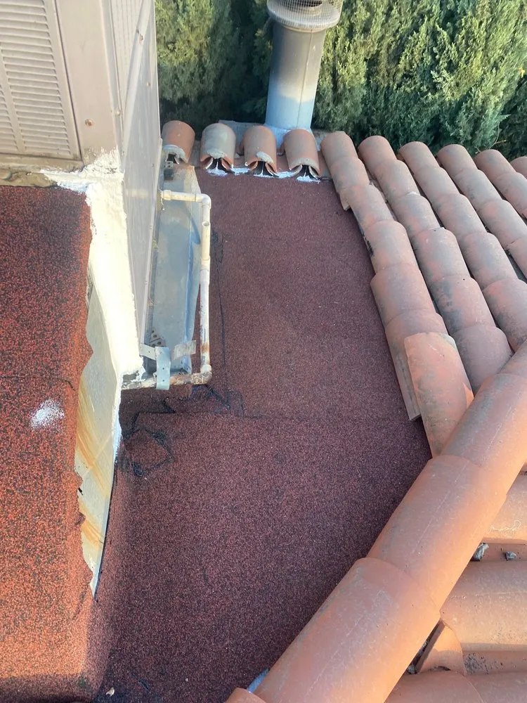 Slide of Rain Tec Roofing