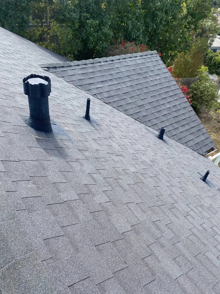 Slide of Rain Tec Roofing