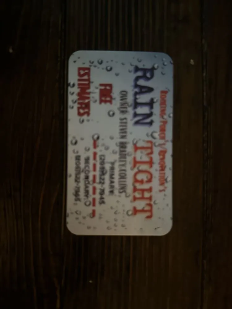 Slide of Rain Tight Roofing