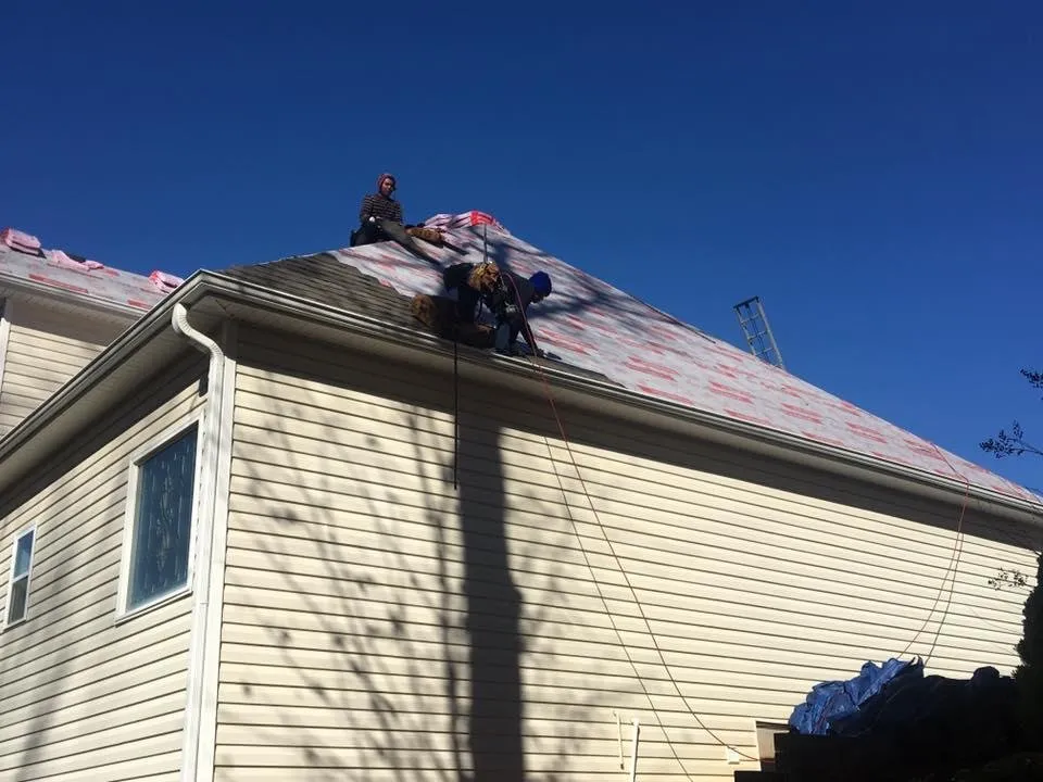 Slide of Rainblocker Roofing & Construction