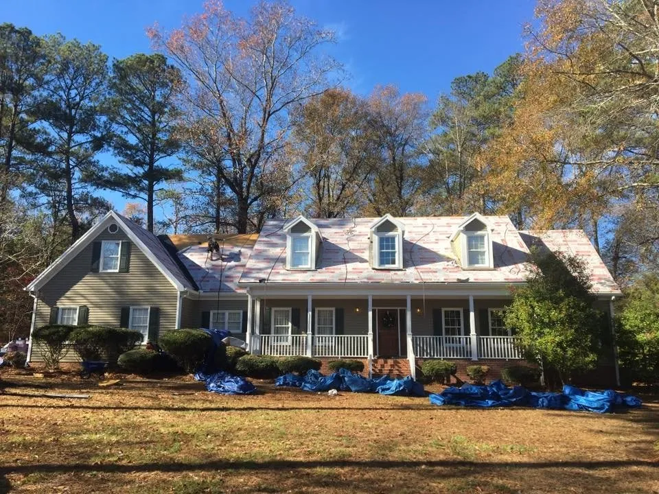 Slide of Rainblocker Roofing & Construction