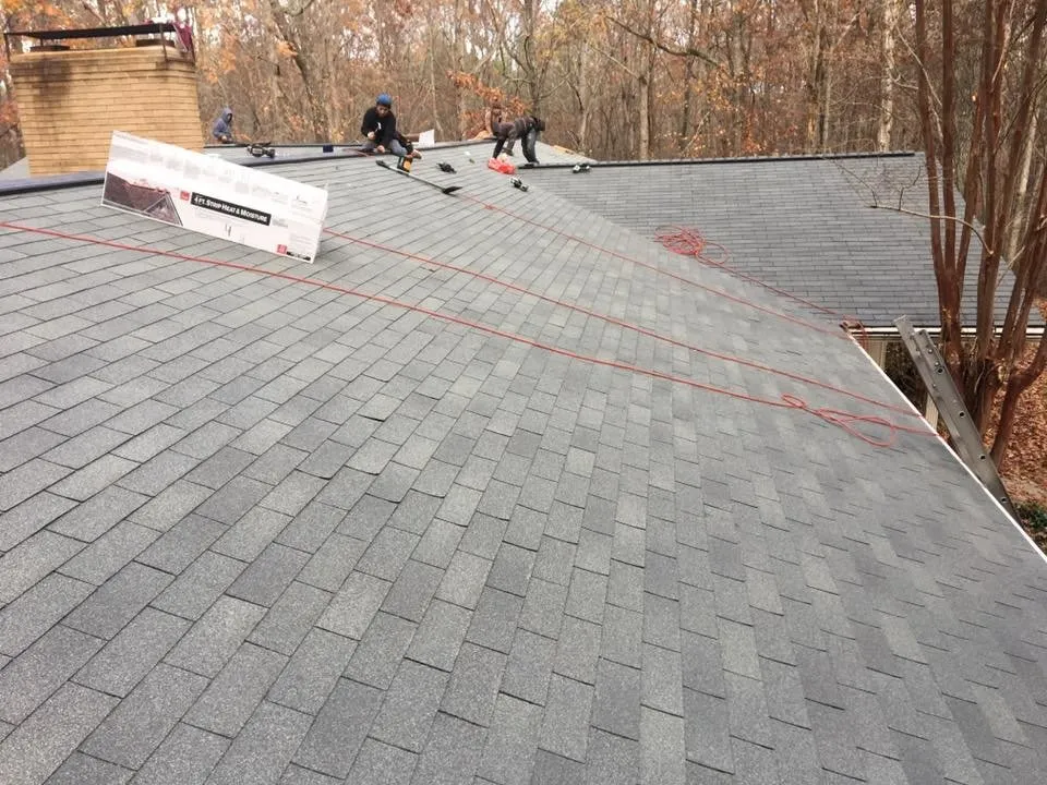 Slide of Rainblocker Roofing & Construction