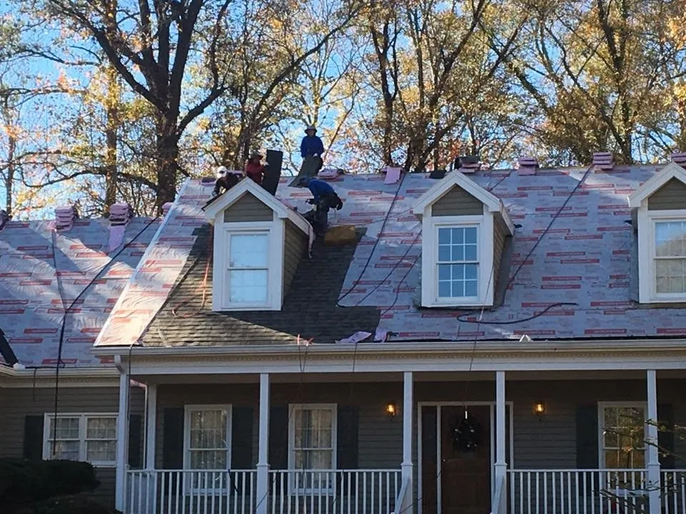 Slide of Rainblocker Roofing & Construction