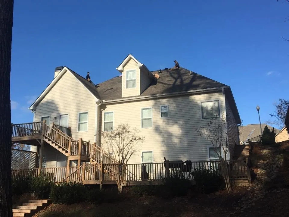 Slide of Rainblocker Roofing & Construction