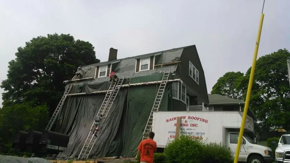 Slide of Rainbow Roofing & Siding