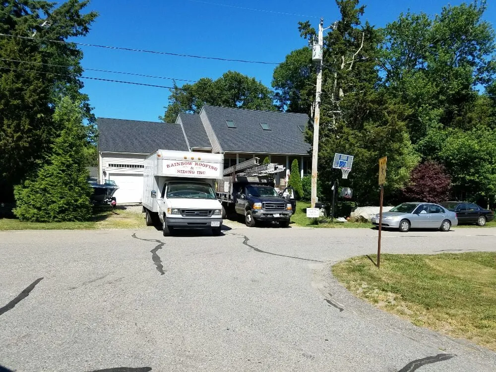 Slide of Rainbow Roofing & Siding