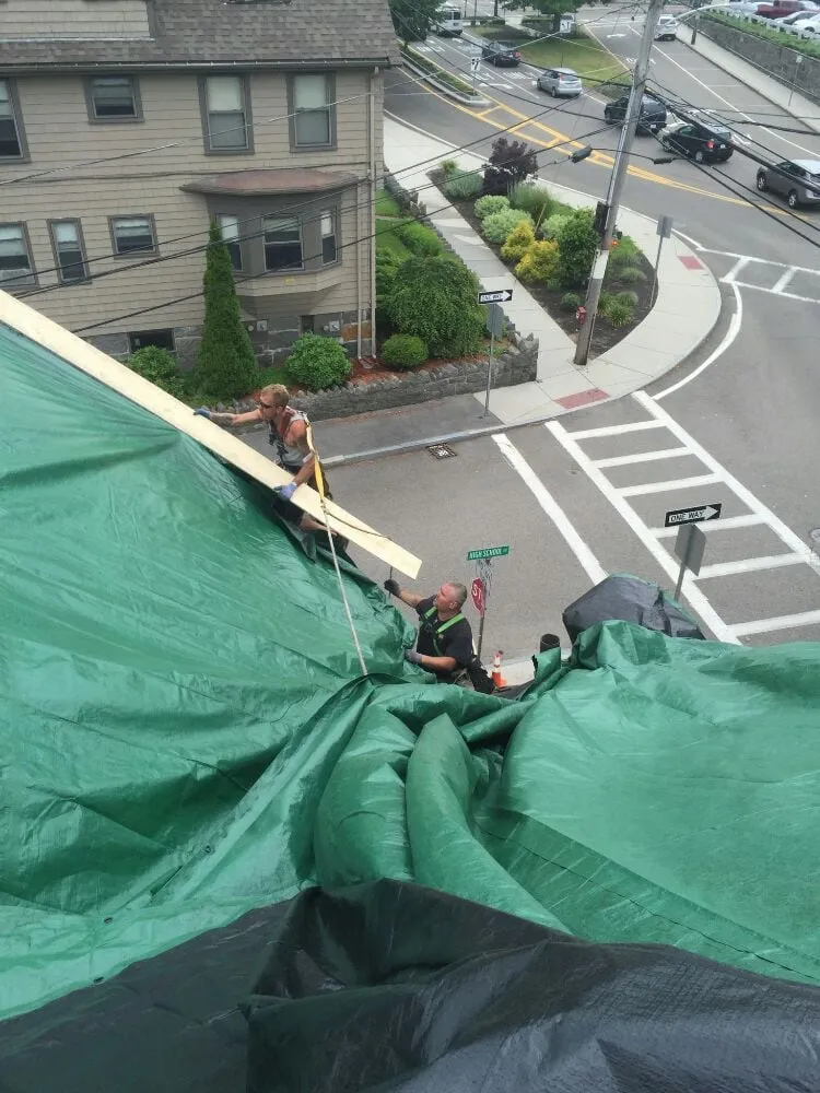 Slide of Rainbow Roofing & Siding