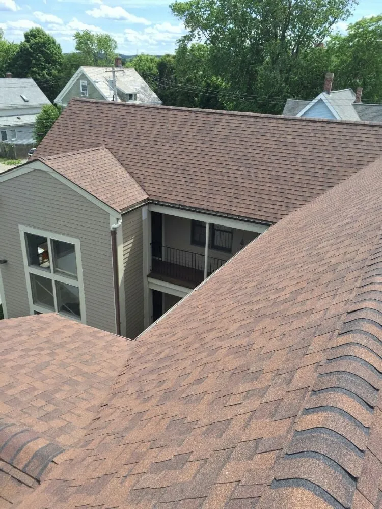 Slide of Rainbow Roofing & Siding