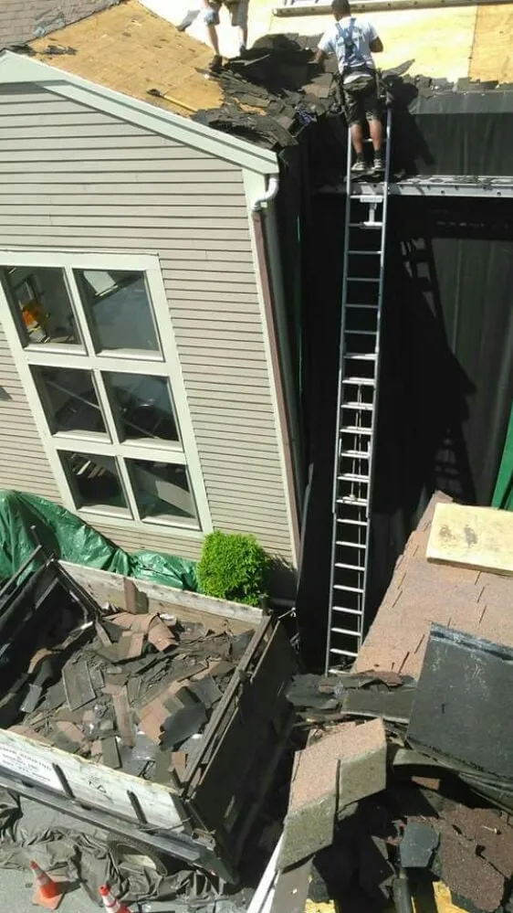 Slide of Rainbow Roofing & Siding