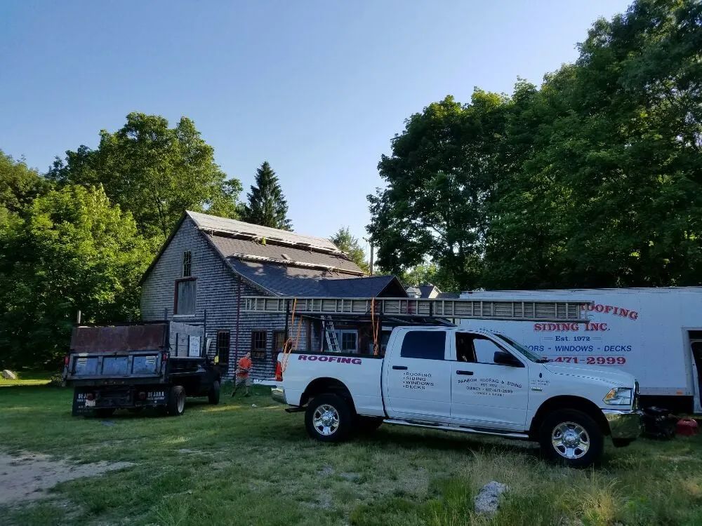 Slide of Rainbow Roofing & Siding