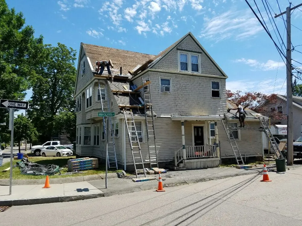 Slide of Rainbow Roofing & Siding