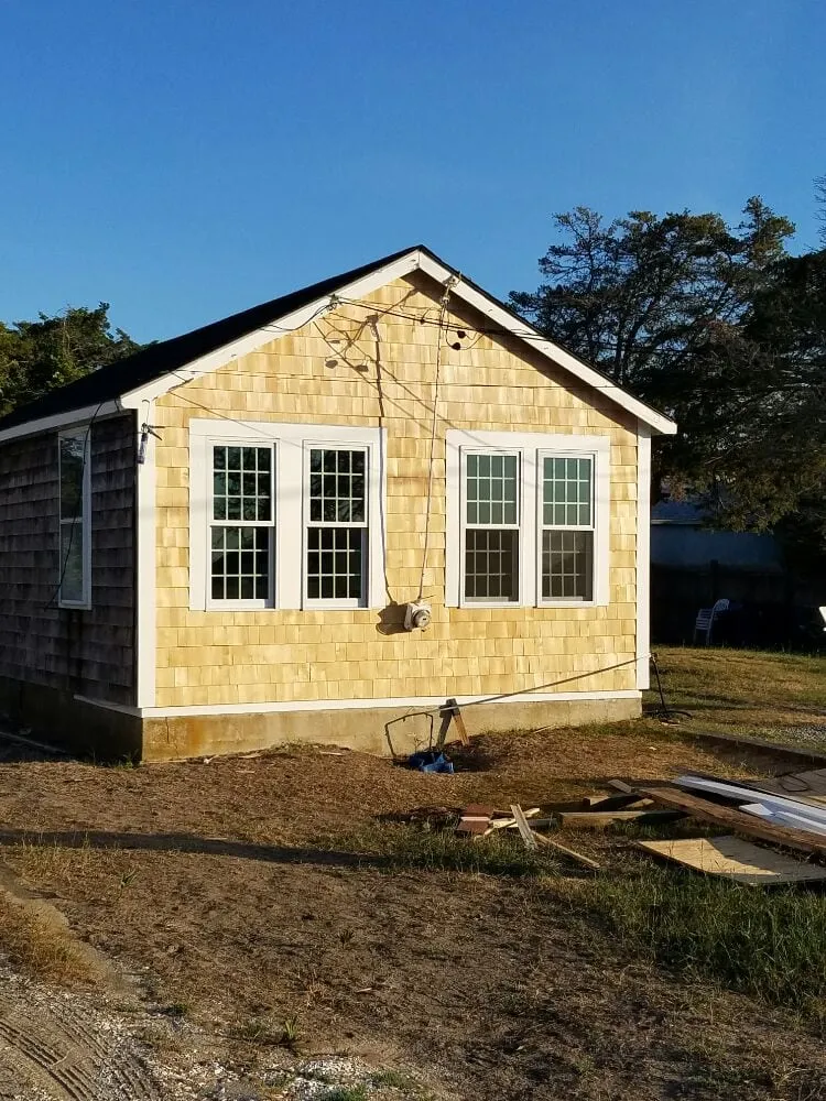 Slide of Rainbow Roofing & Siding