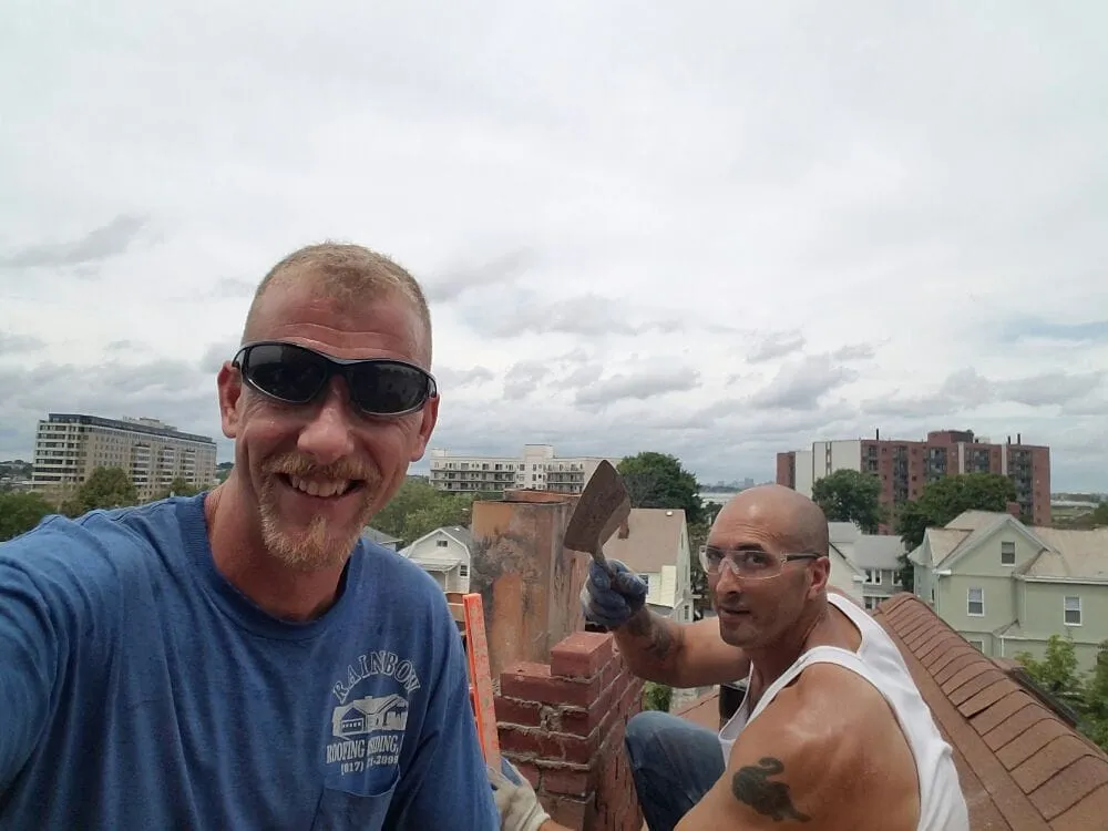 Slide of Rainbow Roofing & Siding