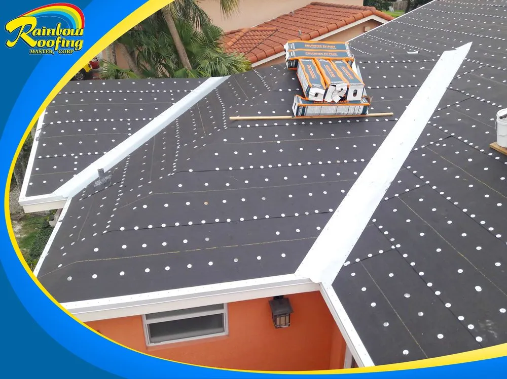 Slide of Rainbow Roofing Master