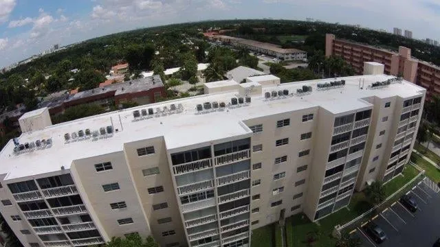 Slide of Rainbow Roofing Solutions