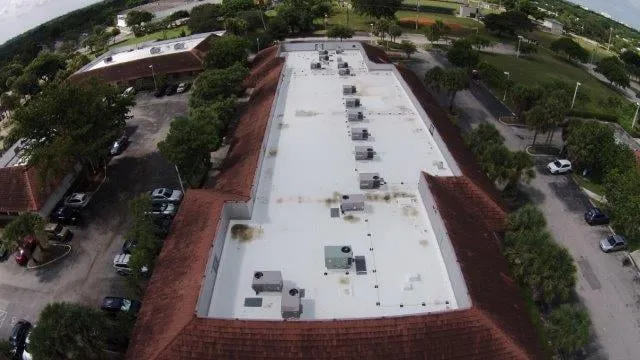 Slide of Rainbow Roofing Solutions